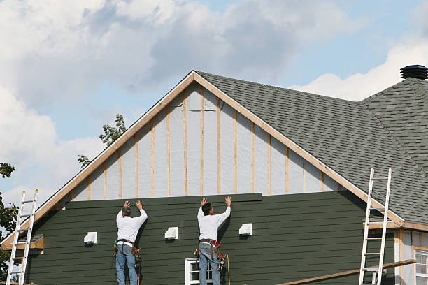 Professional Siding technician working in Bellville, OH